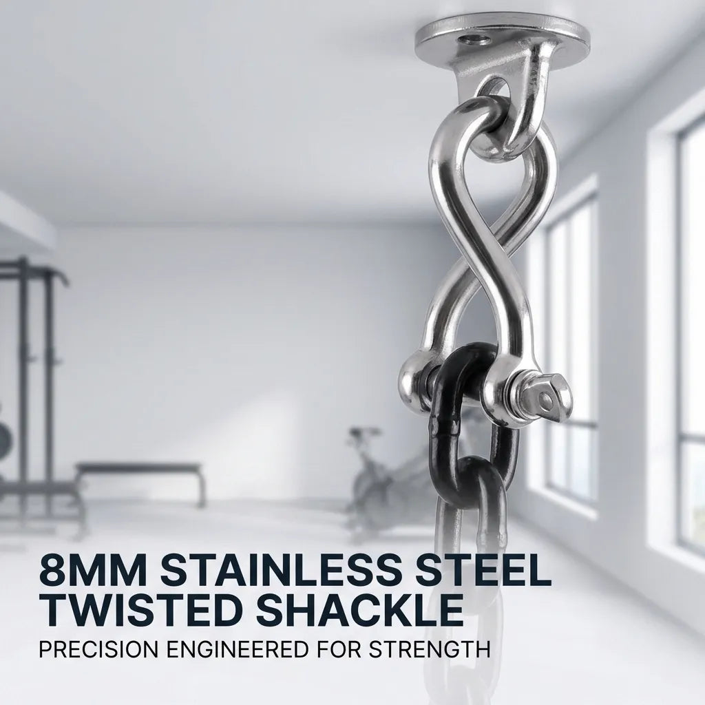 Twisted stainless steel shackle used in a gym environment for hanging heavy training equipment from a ceiling mount.