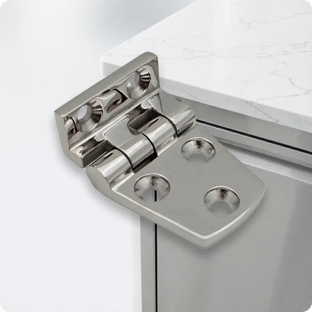 Close-up of the 316 stainless steel hinge mounted on a modern outdoor cabinet with a marble-style countertop surface.