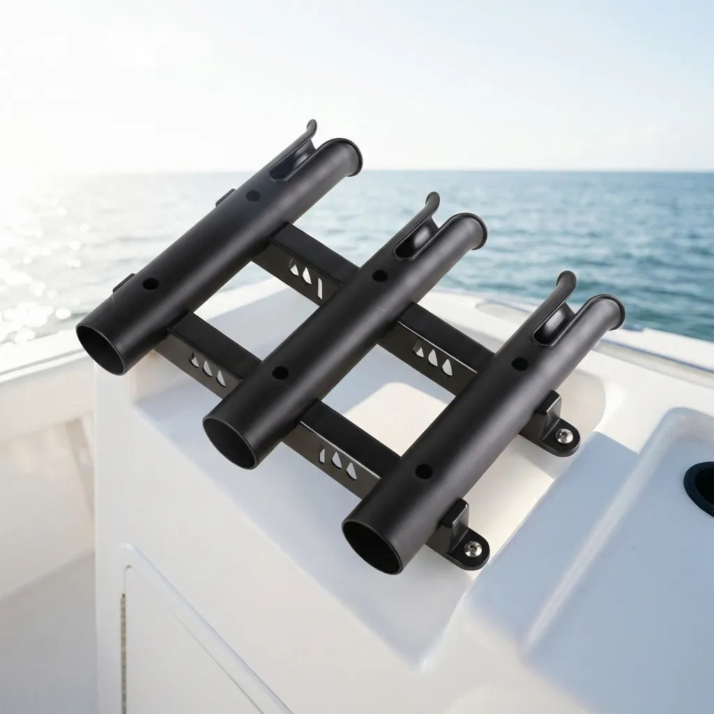 Close-up of the triple rod holder installed on a white fiberglass boat center console with a clear blue ocean horizon in the background.