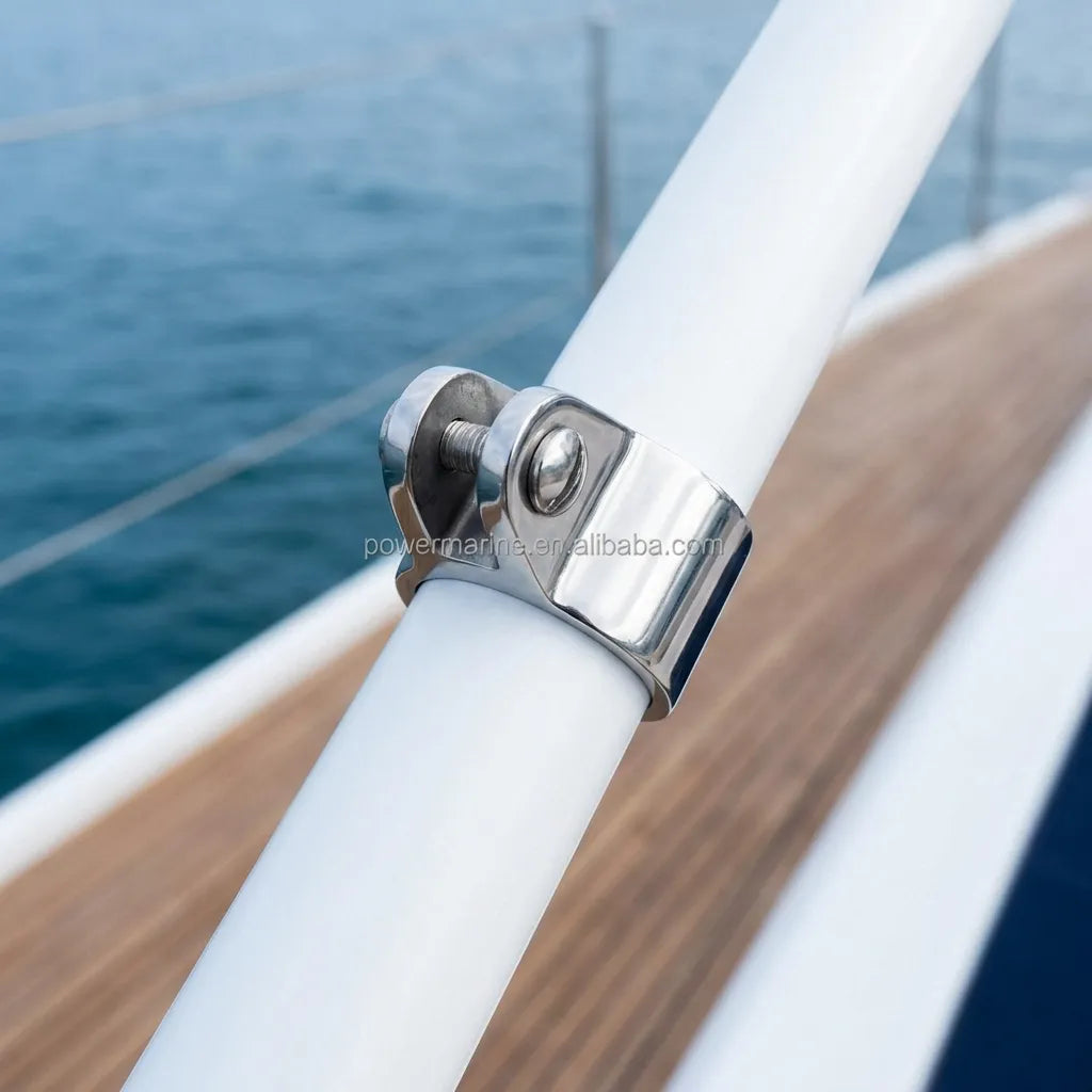 Lifestyle view of a stainless steel bimini jaw slide installed on a white boat railing in a marine environment.