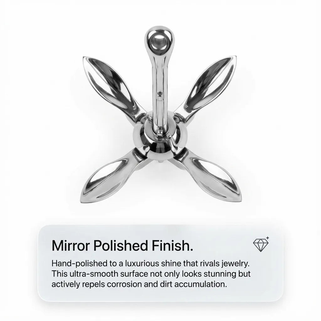 Top-down view of the 4-fluke anchor showing the hand-polished mirror finish designed to repel corrosion and dirt accumulation.