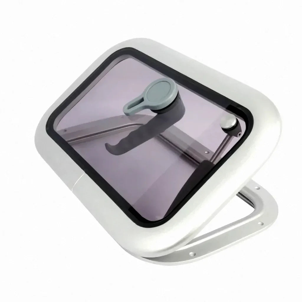 Hero shot of an open marine deck hatch featuring a precision anodized aluminum alloy frame and smoky tinted acrylic window on a white background.