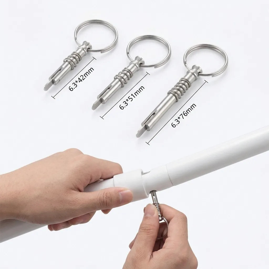 Close-up of a person installing a 1/4 inch quick release pin into a white marine-grade support pole for a boat bimini top.