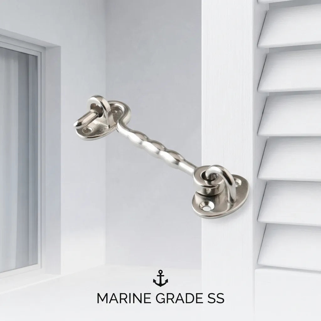 The cabin hook latch used on white exterior window shutters, showing its versatile architectural application for coastal homes.