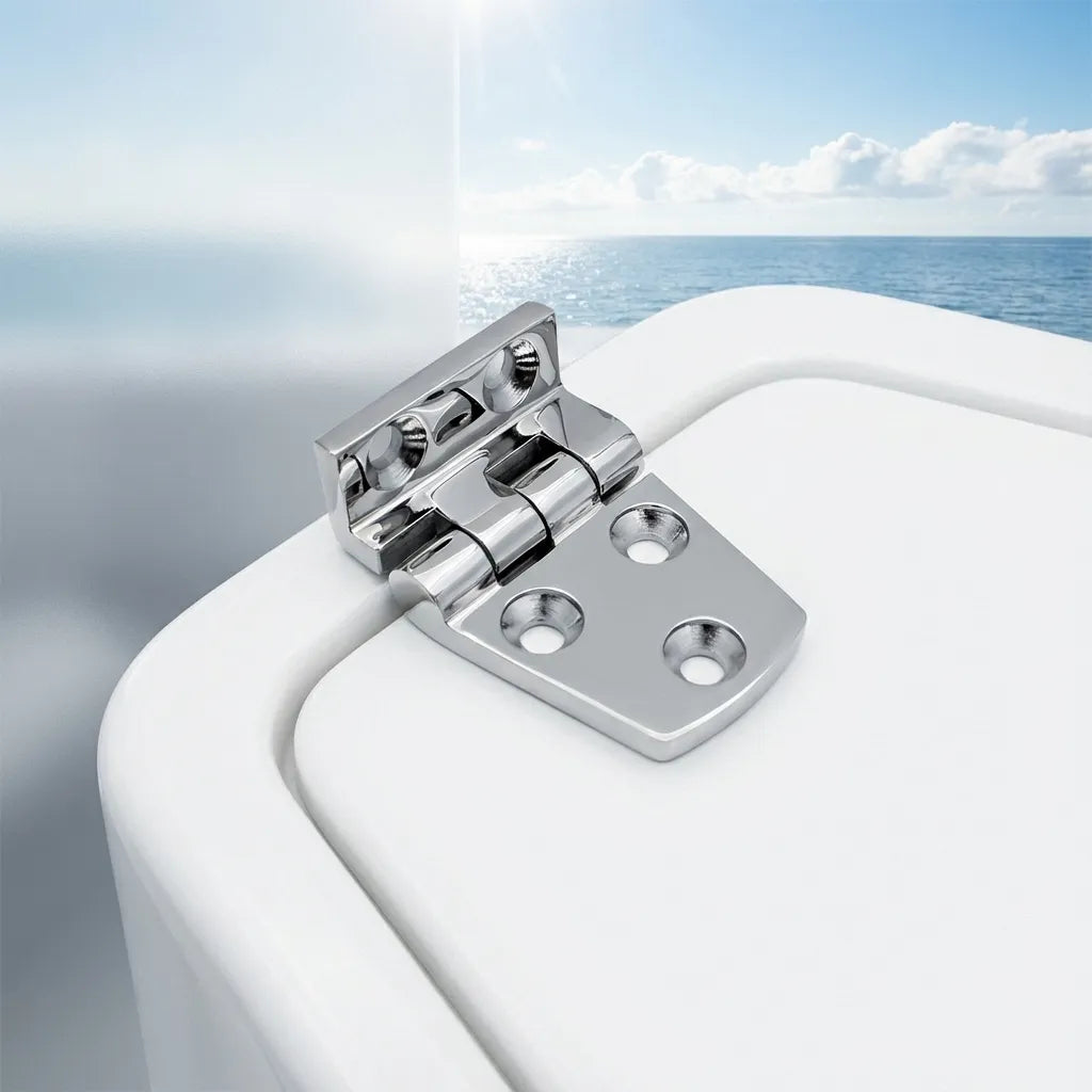 A 90-degree stainless steel hinge installed on a white fiberglass boat hatch compartment with a sunny ocean background.