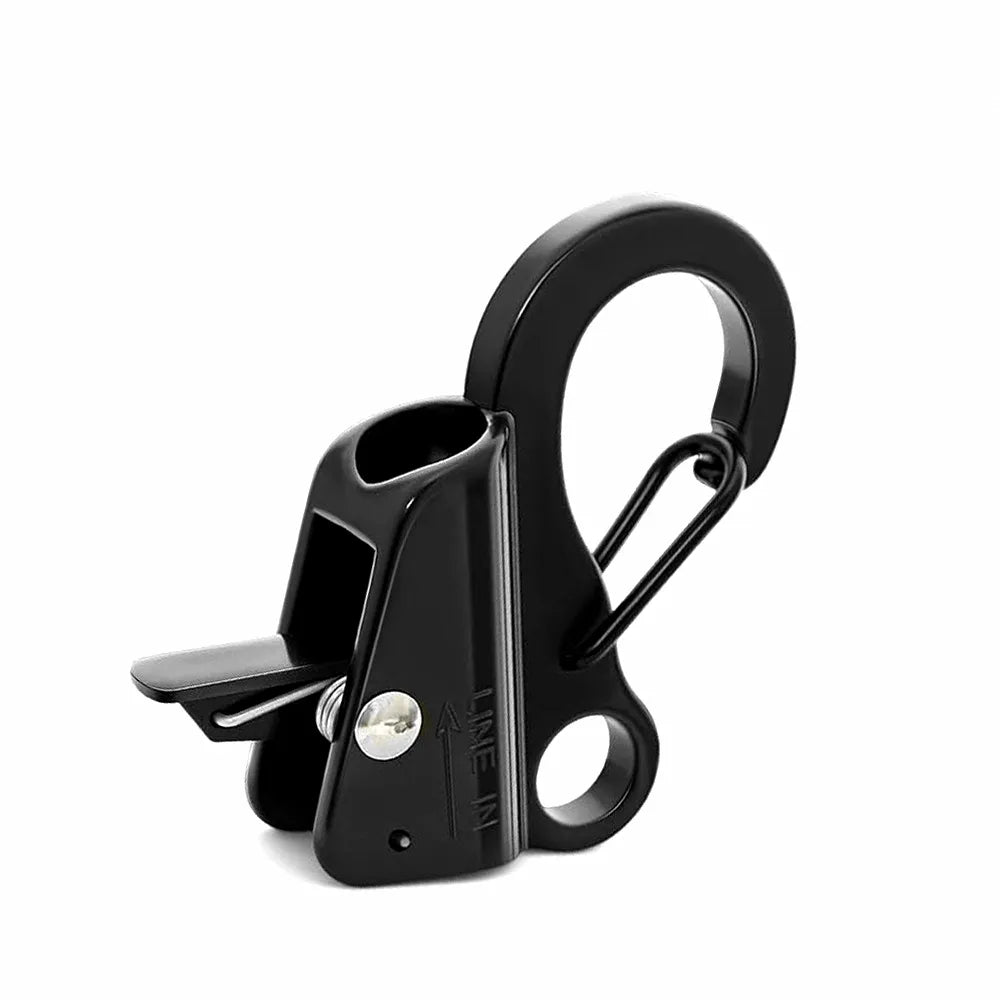 Close-up view of a black 304 stainless steel quick-release rope hook featuring a spring-loaded clamp and an integrated carabiner clip, with 'LINE IN' directional marking, isolated on a white background.