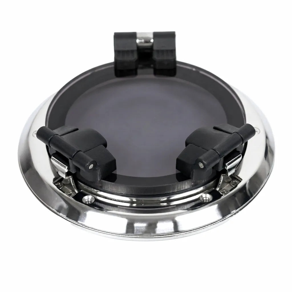 Mirror-polished 316 stainless steel round marine porthole with dark impact-resistant acrylic lens and robust black marine-grade polymer latches, designed for superior vessel integration.