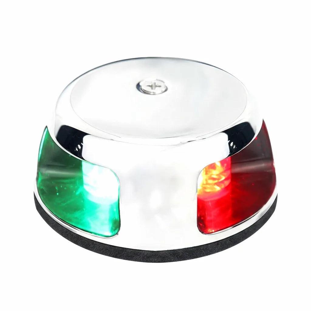 Hero shot of a bi-color LED navigation bow light featuring a mirror-polished 316 stainless steel housing with red and green signal lenses on a pure white background.