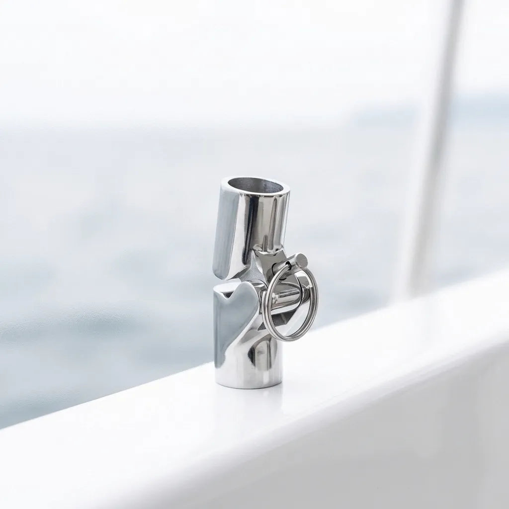 Mirror-polished stainless steel swivel connector mounted on a white boat gunwale, showing its application in a real marine environment.